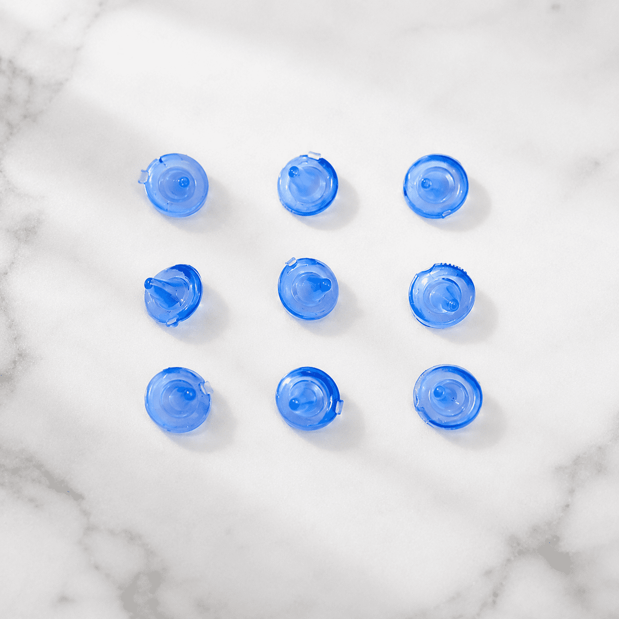 Silicone Earring Back Button
Transparent & Blue Rubber Earring
Stoppers - Image 3
